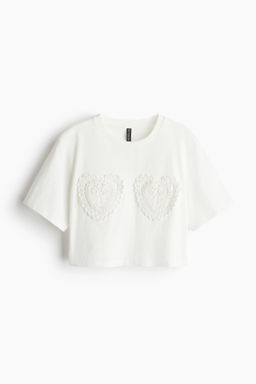 Camiseta con aplicaciones
