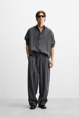 RELAXED FIT FLOWING TROUSERS