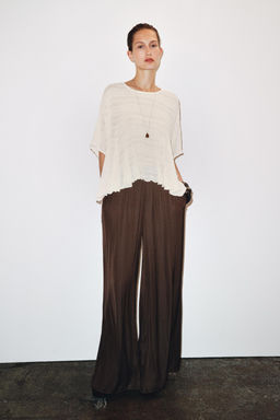 ASYMMETRIC TEXTURED CAPE
