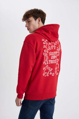 Толстовка свободного кроя с капюшоном Keith Haring в рождественской тематике