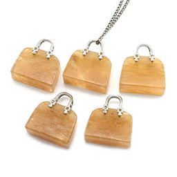 Оригинальная подвеска с халцедоном в форме сумочки 25*10*27мм цв.желтый.