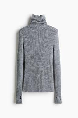 Top de cuello alto en lana merino