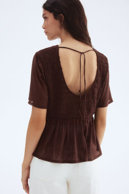 Top nido de abeja con peplum - H&m фото 7