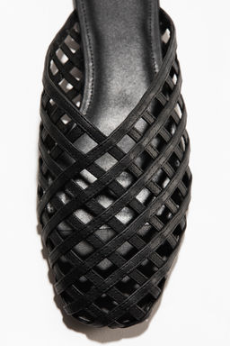 Mules con dise?o entrelazado - H&m фото 3