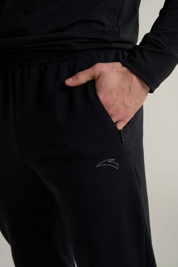 Брюки трикотажные утепленные Черный ANTA RUNNING Knit Track Pants фото 7