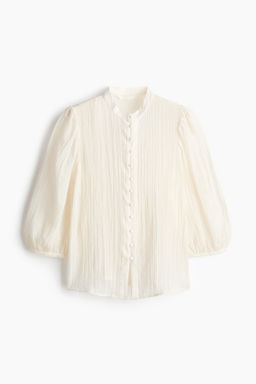 Blusa con mangas globo