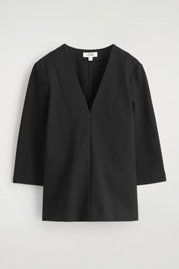 BLUSA EL?STICA CON CUELLO DE PICO