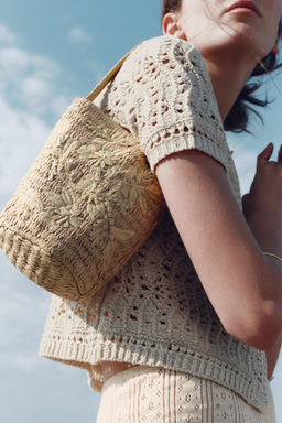 BRAIDED BASKET BAG WITH DESIGN