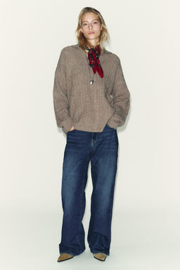 CABLE-KNIT POLO SWEATER