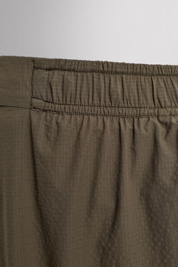 PANTALONES CORTOS LIGEROS RUNNING 3" / Verde medio