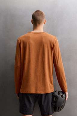 CAMISETA T?CNICA GRAVEL MANGA LARGA ESTRUCTURA / Ocre