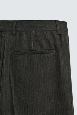LIMITED EDITION FLARED FIT TROUSERS