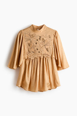 Blusa de jacquard con detalles bordados