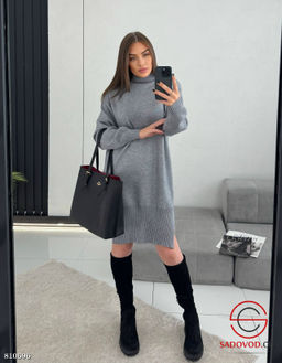 Вязаный свитер длинный