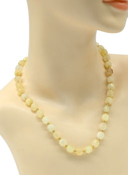 Бусы граненые из кальцита сегмент 8*10мм цв.цитрин, 49см