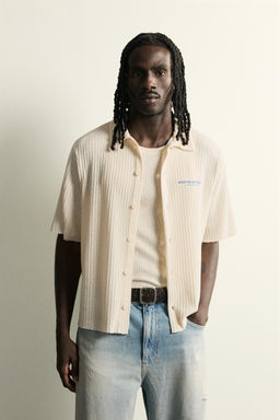 CAMISA ESTRUCTURA CALADA TEXTO ESTAMPADO / Blanco roto - Zara фото 2