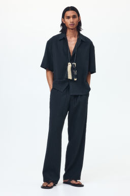 Pantal?n texturizado Relaxed Fit - H&m фото 5
