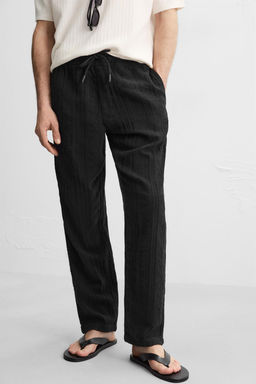 RELAXED FIT TEXTURED TROUSERS - Zara фото 7
