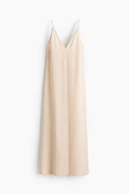 Vestido efecto arrugado con lazada