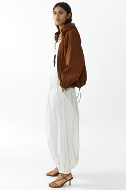 Chaqueta de nailon con capucha - H&m фото 7