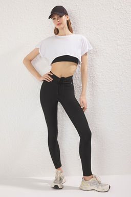 TRENDYOLMILLA Siyah Buzgulu ve Baglamal? Reflektor Detayl? Tam Boy Orme Spor Tayt THMSS25TY00019