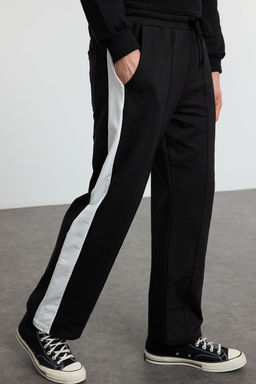 TRENDYOL MAN Siyah Oversize/Genis Kesim Ac?k Paca Renk Bloklu Esofman Alt? TMNAW25EA00006