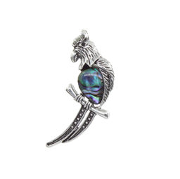 Брошь "Попугай на веточке" со вставкой из гелиотиса