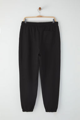 TRENDYOL MAN Siyah Oversize/Genis Kesim Lastik Paca Gulen Yuz Bask?l? Jogger Esofman Alt? TMNSS22EA0119 - Trendyolmilla фото 6