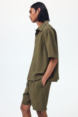 Pantal?n corto texturizado Relaxed Fit - H&m фото 8