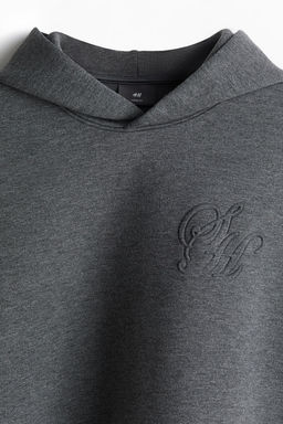 Sudadera efecto neopreno con capucha Loose Fit - H&m фото 6