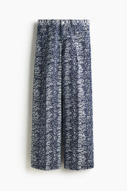 Vaquero en denim boucl? con raya