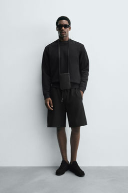 INTERLOCK BERMUDA SHORTS WITH LABEL
