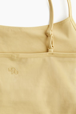 Top de deporte en DryMove con tirantes finos - H&m фото 7