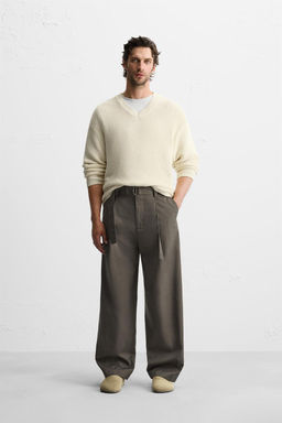 BELTED PLEATED TROUSERS