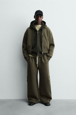 WIDE-LEG NEOPRENE-EFFECT TROUSERS WITH STUDS - Zara фото 11