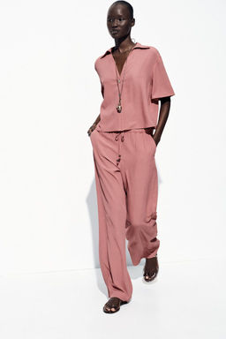 WRINKLED-EFFECT WIDE-LEG TROUSERS