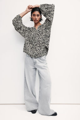 Blusa con mangas globo