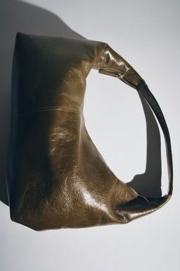 OVAL LEATHER HANDBAG