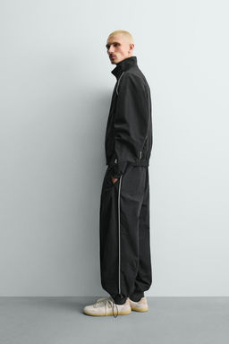PANTAL?N JOGGER T?CNICO BANDAS CONTRASTE / Negro - Zara фото 14