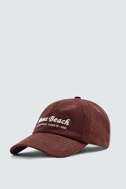 CAP WITH EMBROIDERED TEXT