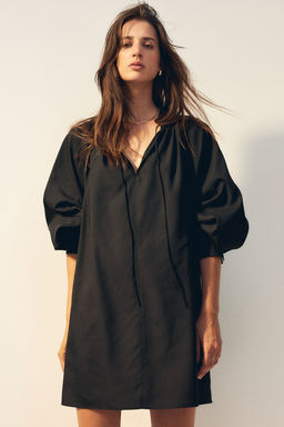 Vestido oversize con tiras de anudar