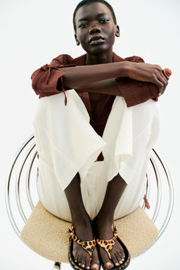 ANIMAL PRINT LEATHER AND SHEEPSKIN SANDALS