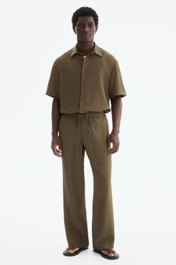Pantal?n texturizado Relaxed Fit - H&m фото 5