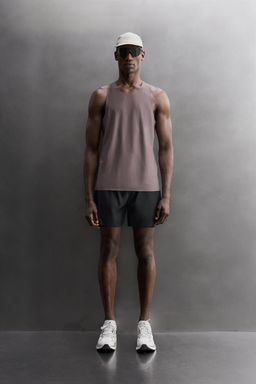 CAMISETA TANK LIGERA RUNNING / Morado