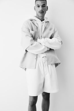 Pantalon corto revestido Relaxed Fit