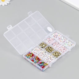 Бусины в шкатулке «Диски с рисунками», 15 делений, 10×17.5×2 см