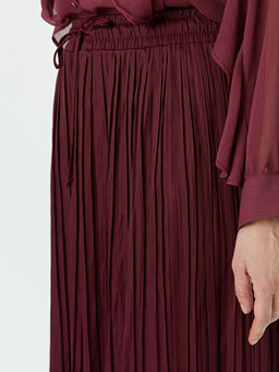 Beli Lastikli Pileli Etek