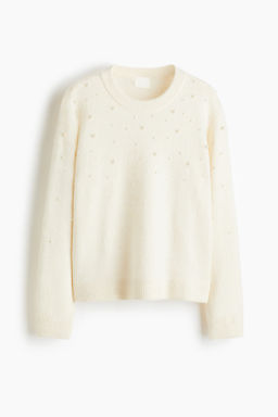 Jersey con detalles decorativos