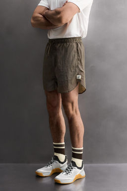 PANTALONES CORTOS 2 EN 1 TRAINING / Marr?n