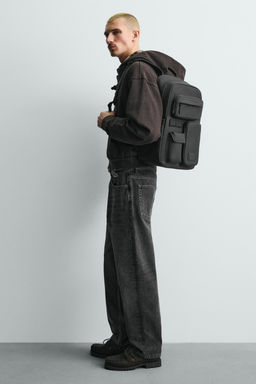 RUBBERISED MULTI-POCKET BACKPACK